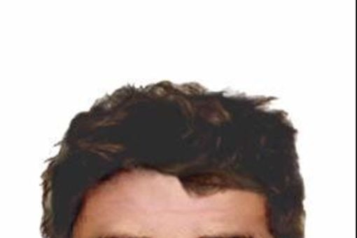 Police image of man they believe may be connected to the lighting of a bushfire