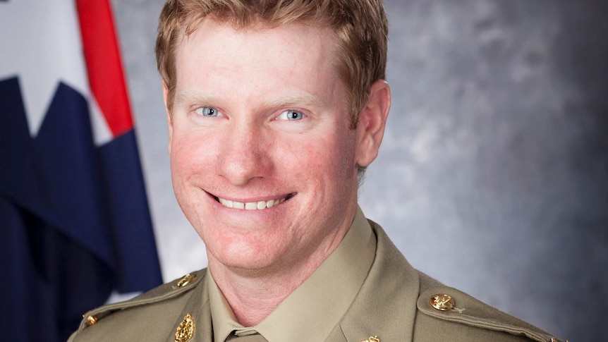 Portrait of young soldier wearing medals, including Victoria Cross