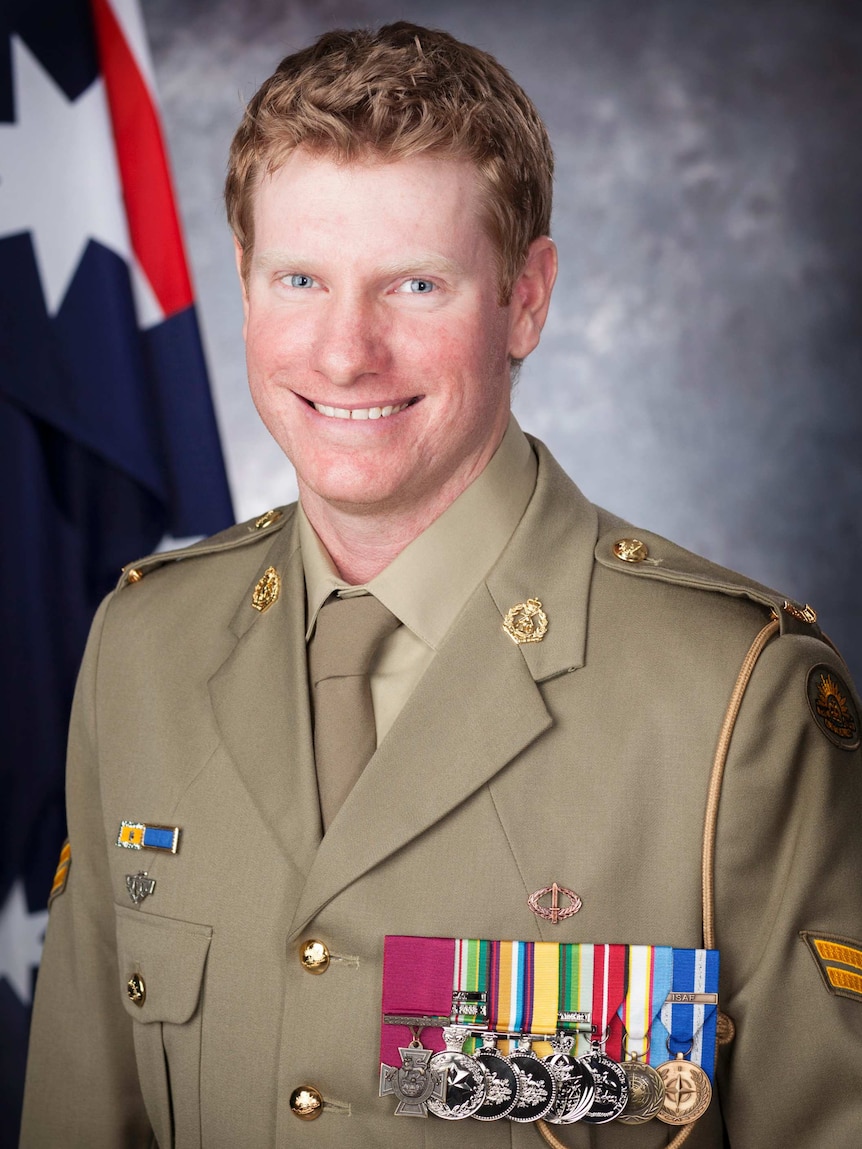 Portrait of young soldier wearing medals, including Victoria Cross