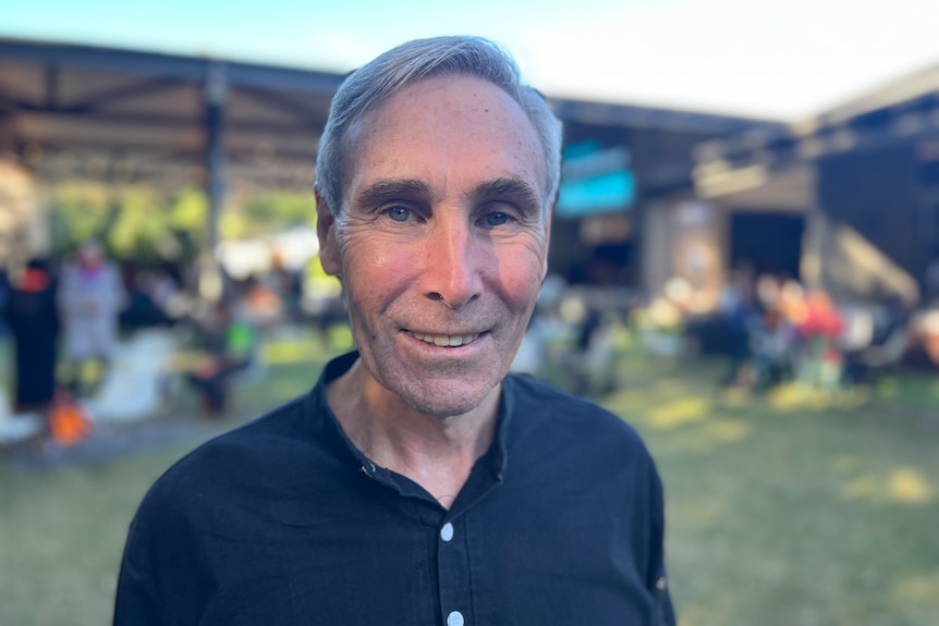 A portrait of Greg McIntyre smiling at the camera.