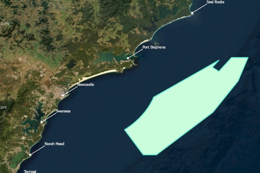 A graphic with a satelite image of a coast and a rectangle-type shape showing where a wind zone will be.