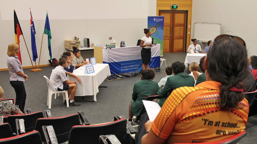 Indigenous Australian students participate in a quiz show set up in a lecture theatre