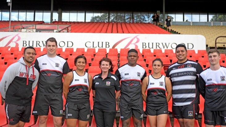 West Harbour President Siobhan Seiuli poses with players from the embattled rugby union club