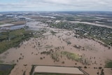 Brown floodwater across plains.