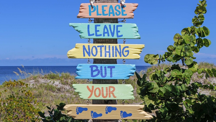 'Please Leave Nothing But Footprints' sign for story about ethical global travel