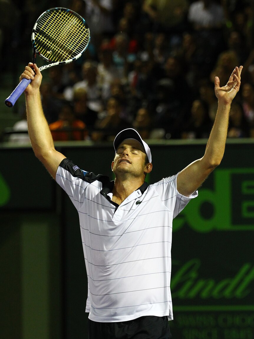 Miami upset ... Andy Roddick reacts after defeating Roger Federer