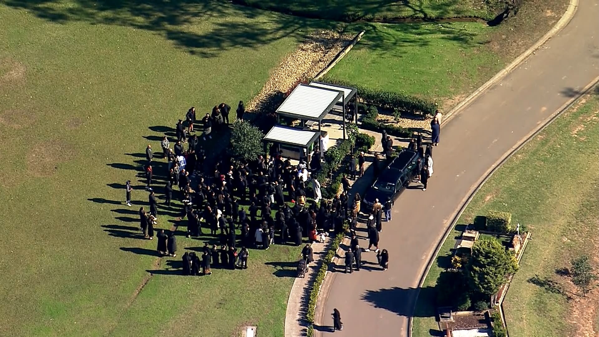Mourners farewell gangster a day after gunman targets wrong funeral venue