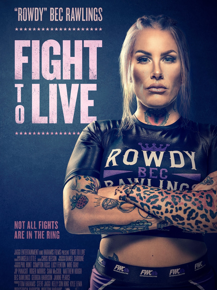 A poster for a film has a photograph of a heavily tattooed woman crossing her arms, with the title 'Fight to Live' in capitals.