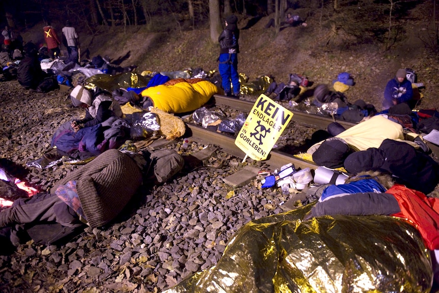 Anti-nuclear protesters sleep on railroad tracks where the castor train was expected to pass.