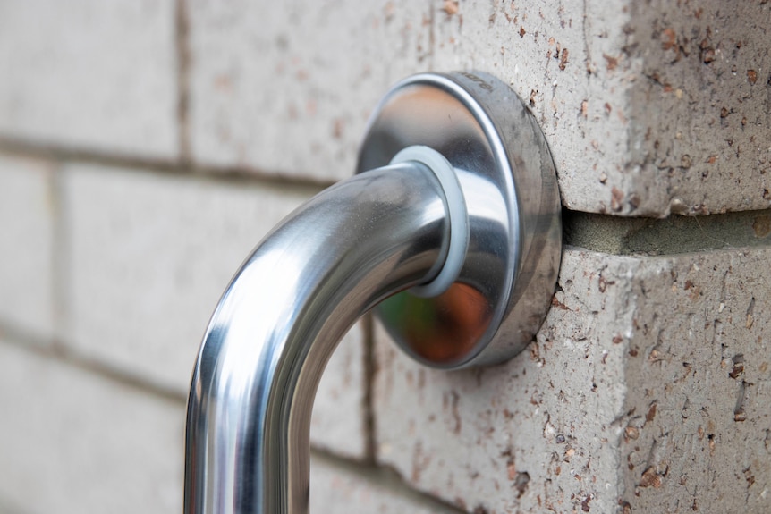 A close-up of a handrail.