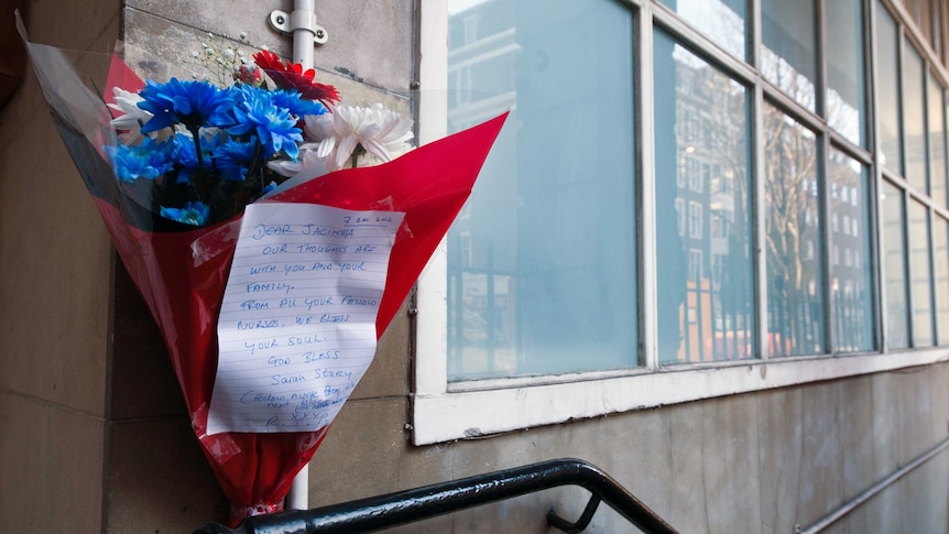 A bunch of flowers is left at the King Edward VII hospital in central London in memory of nurse Jacintha Saldanha.