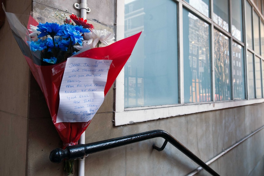 A bunch of flowers is left at the King Edward VII hospital in central London in memory of nurse Jacintha Saldanha.