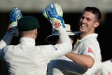 Mitch Marsh celebrates a wicket