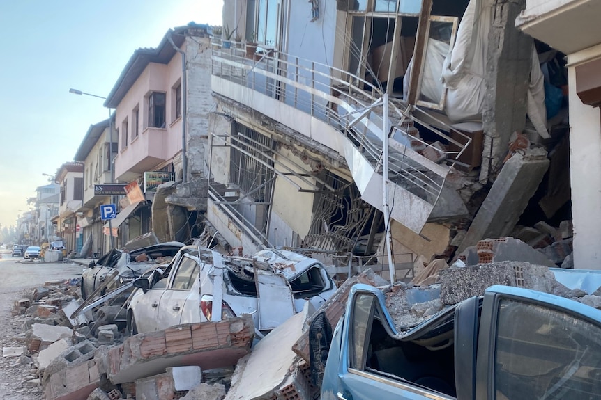 Cars smashed under rubble in Turkiye earthquake zone