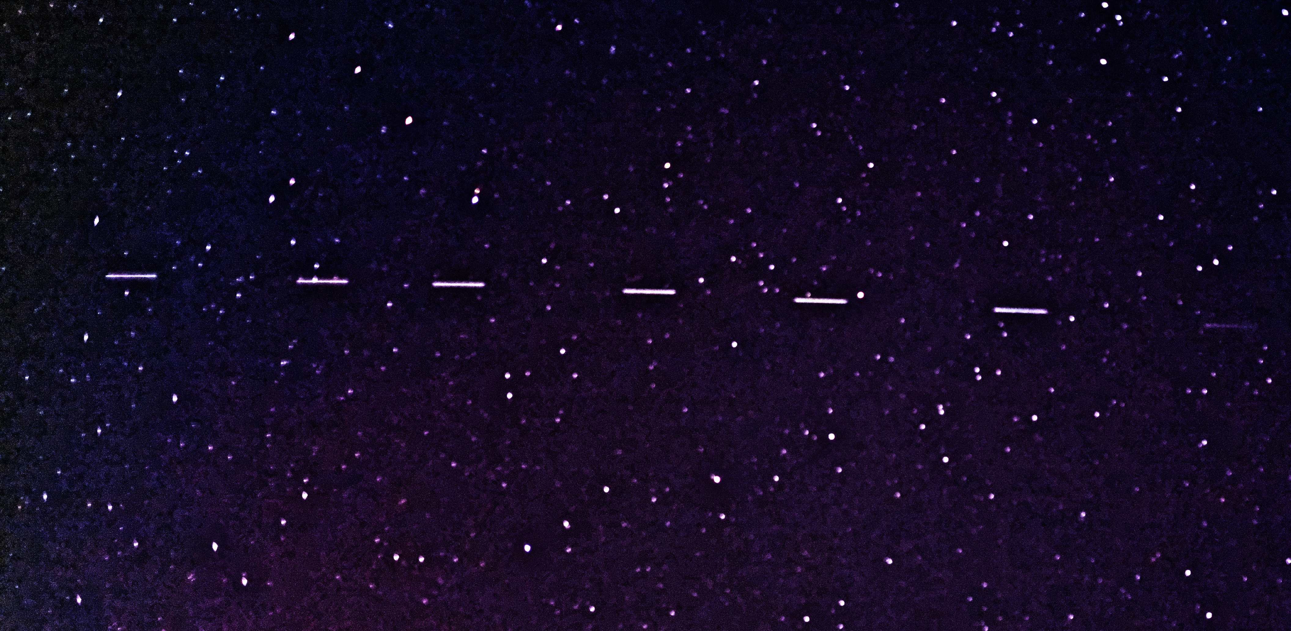 A night sky with lines across it