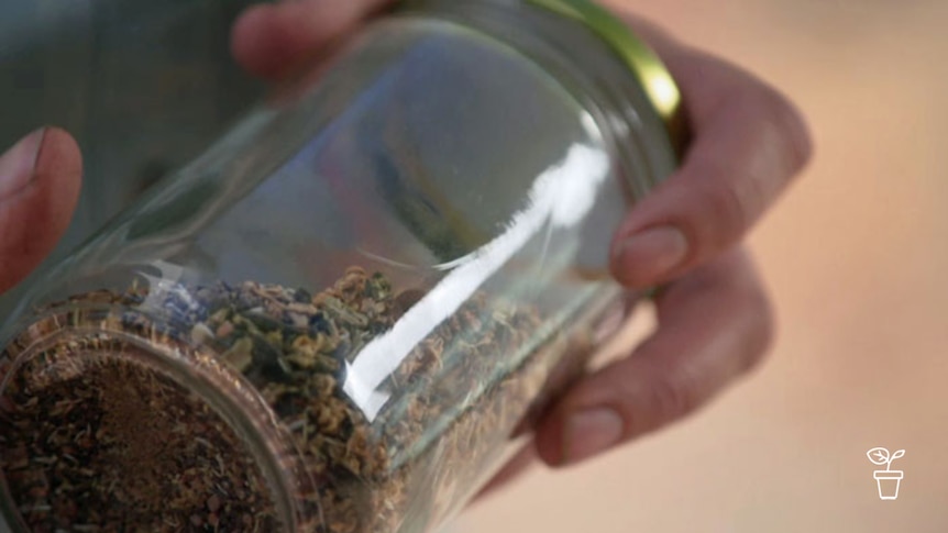 Jar filled with grains and seeds