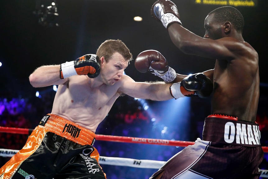 Jeff Horn swings a punch at Terence Crawford