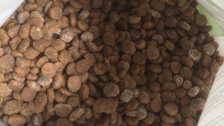 An open bag of Applaws with mouldy dog food