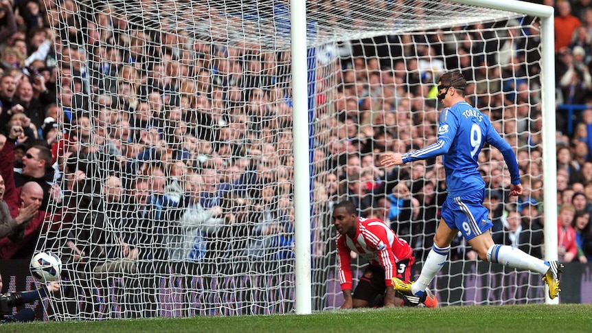 Chelsea's Fernando Torres watches the ball in the net after a Sunderland own goal at Stamford Bridge.