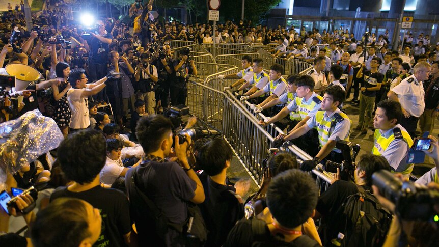 Protesters and police face off