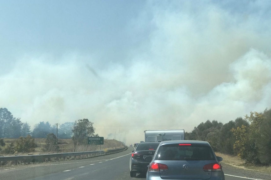 Traffic backed up on Hume Highway at Paddys River due to grassfire