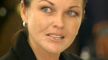Schapelle Corby bites her lip as the verdict is read out