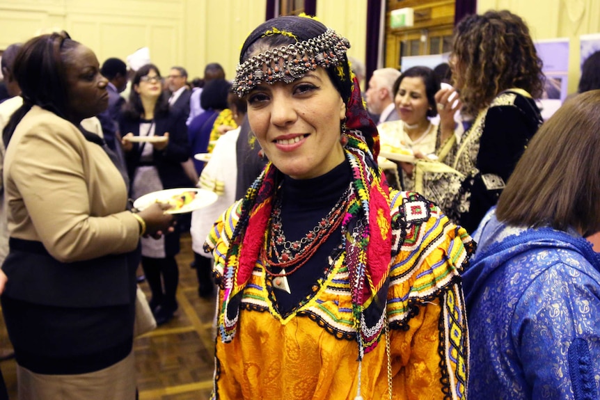 A lady in a headdress celebrating Africa Day 2017 in Canberra.