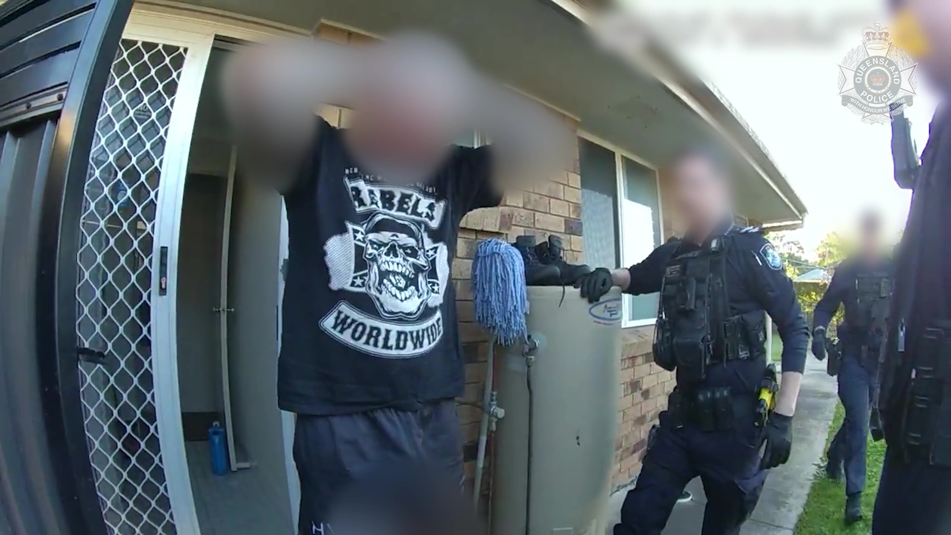Qld police charge 23 men in crackdown on Rebels bikie gang