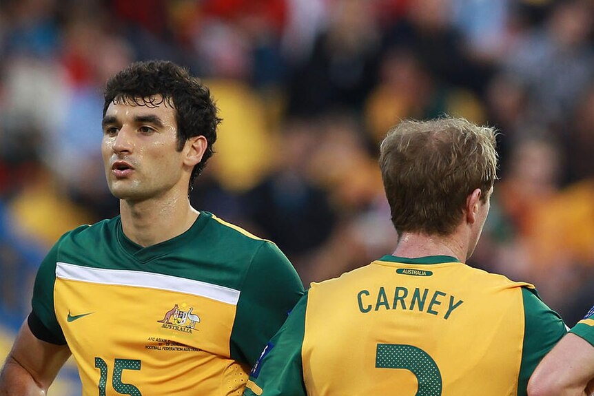 Mile Jedinak (centre) says Iraq's strength as a unit will provide a tough test for the Socceroos.