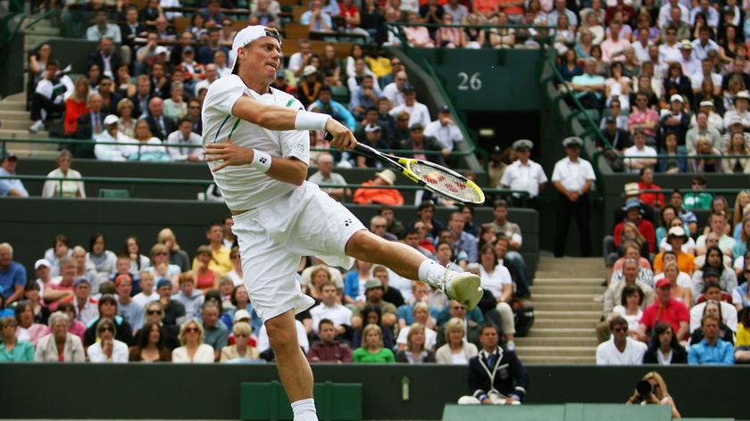 Feeling the pinch: Hewitt's troublesome hip could keep him courtside after his elimination.