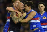 Tom Liberatore and Nathan Jones get in each other's faces