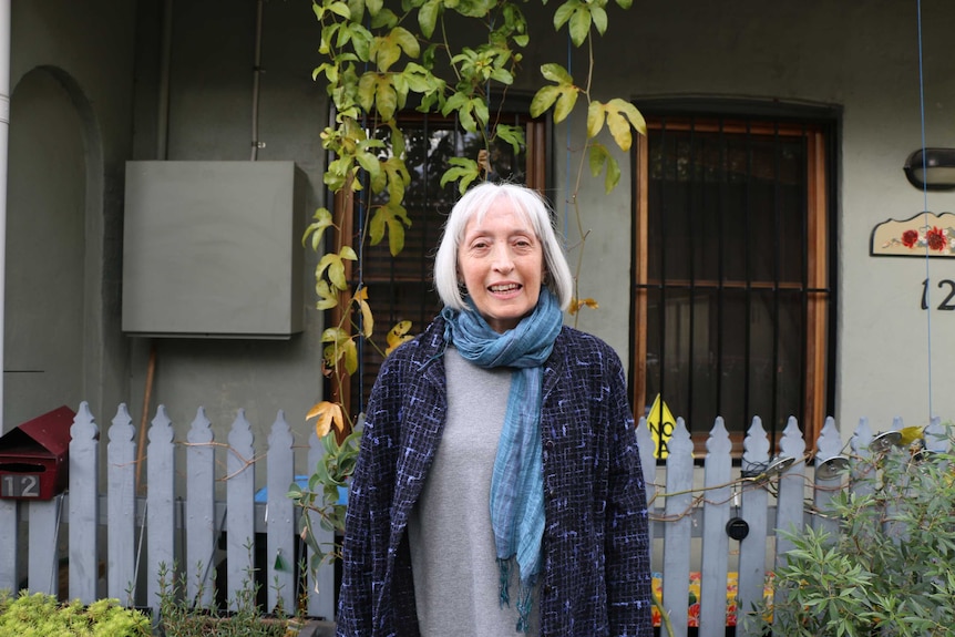 Asthma sufferer Margaret Widders standing in front of her Sydney home