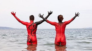 A mass nude swim was one of the features of this year's Dark MOFO festival.