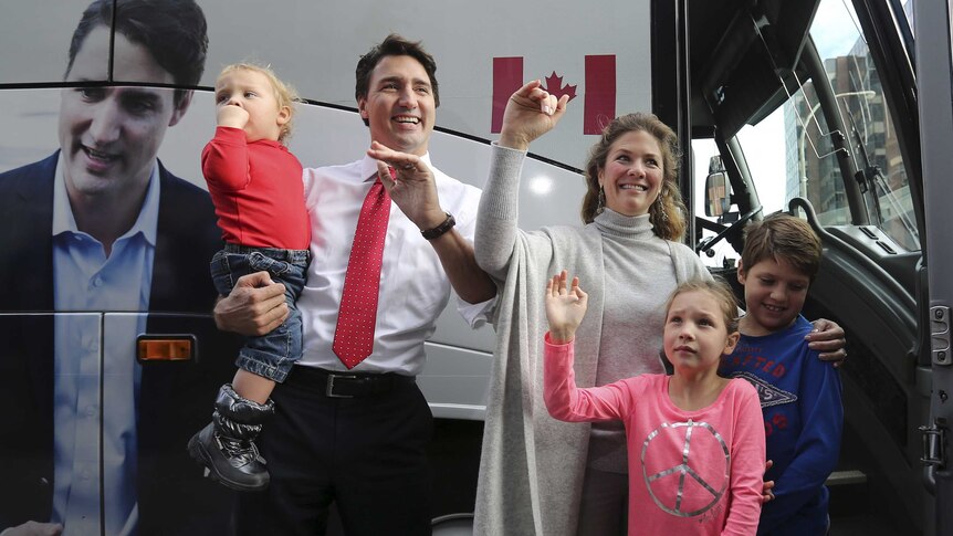Liberal leader Justin Trudeau with his family after voting in Montreal, Quebec