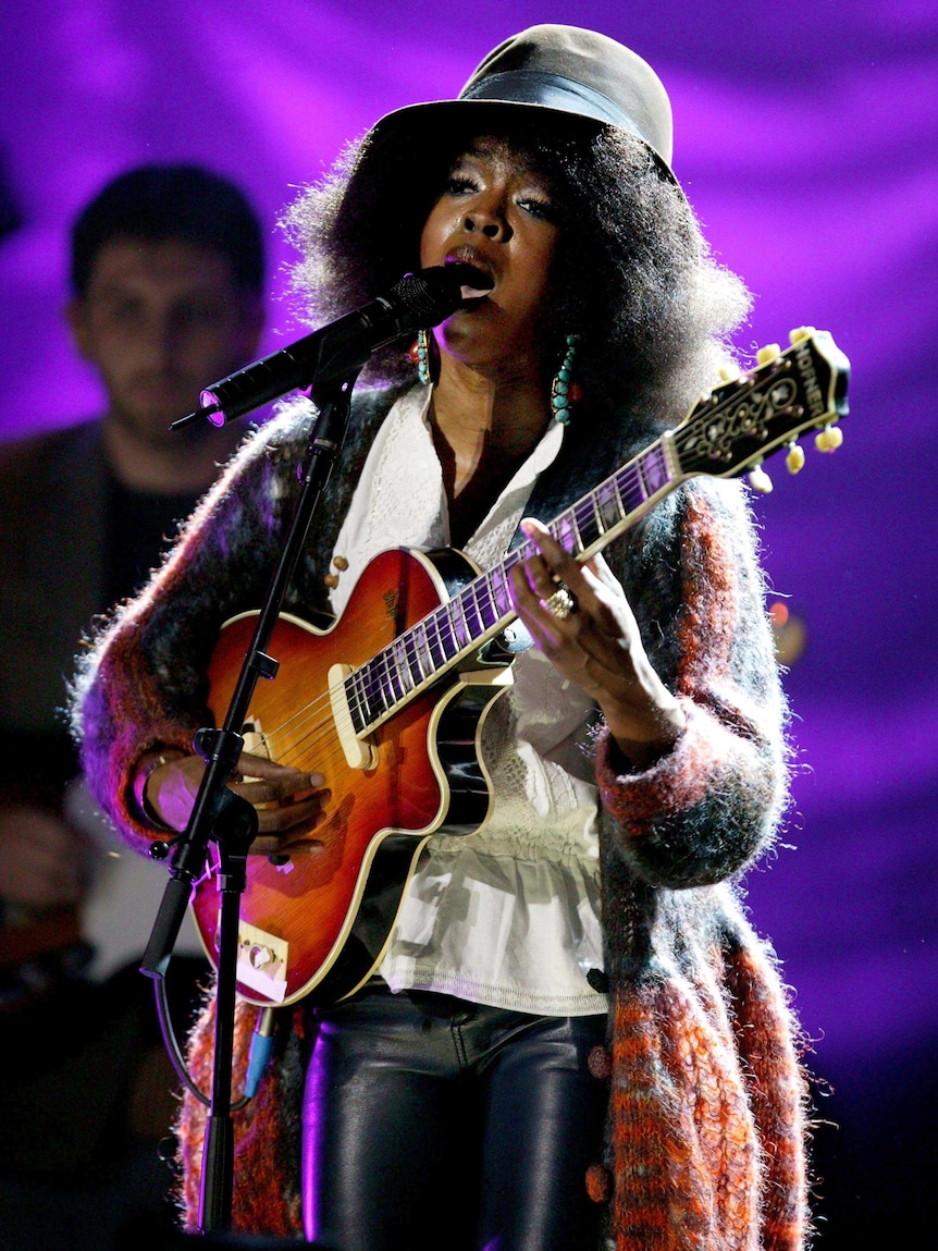 Lauryn Hill performs on stage in 2005.