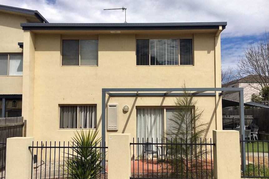 A house with bullet holes.