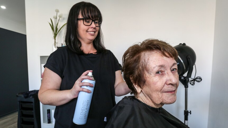 Hairdresser Jackie Stahl with client Maureen Turnball who used to run the local milk bar on the site.