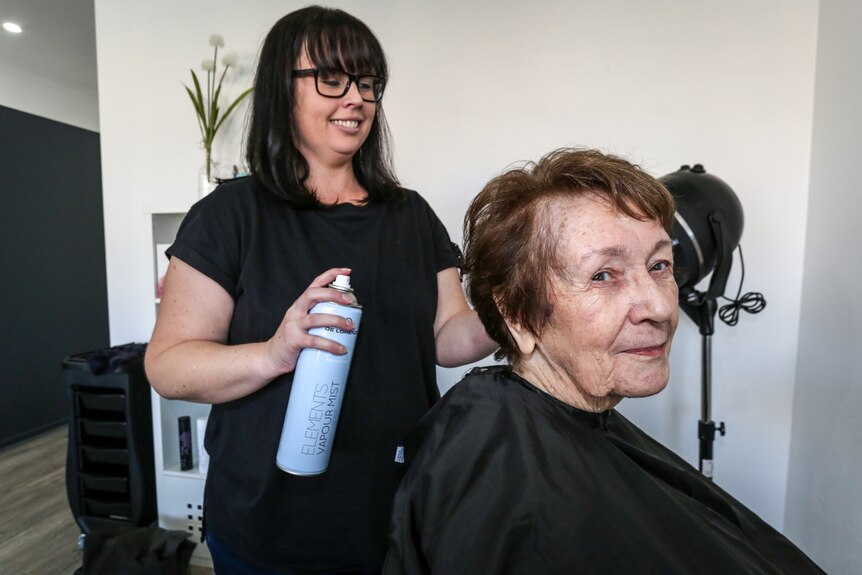 Hairdresser Jackie Stahl with client Maureen Turnball who used to run the local milk bar on the site.