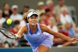 Tight victory: Ana Ivanovic lunges to return a ball against Jelena Dokic.
