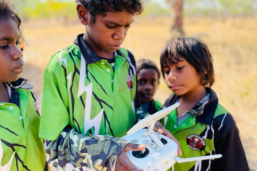 A student operates a drone.