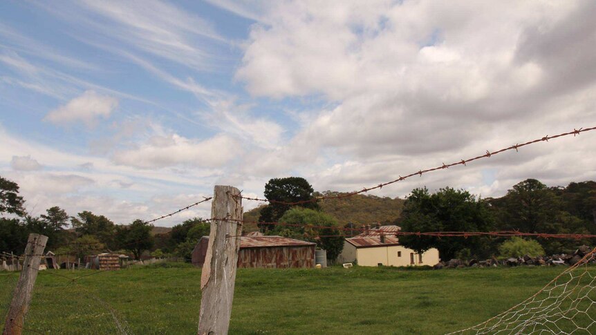 A barbed wire fence surrounds a rural property at Hill End.