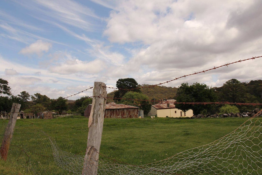 A barbed wire fence surrounds a rural property at Hill End.