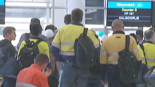 Mining workers at Perth Airport