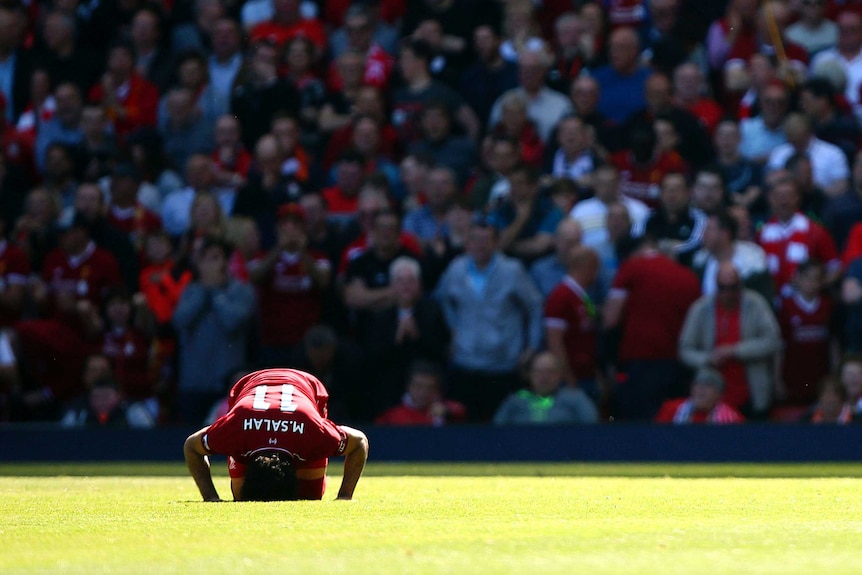 Liverpool's Mohamed Salah celebrates scoring his side's first goal against Brighton in May 2018.