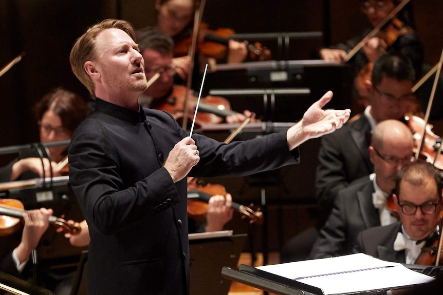 Conductor Benjamin Northey holds a baton during a Melbourne Symphony Orchestra (MSO)