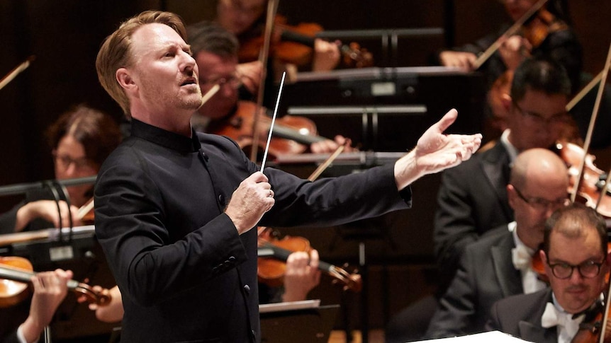 Conductor Benjamin Northey holds a baton during a Melbourne Symphony Orchestra (MSO)