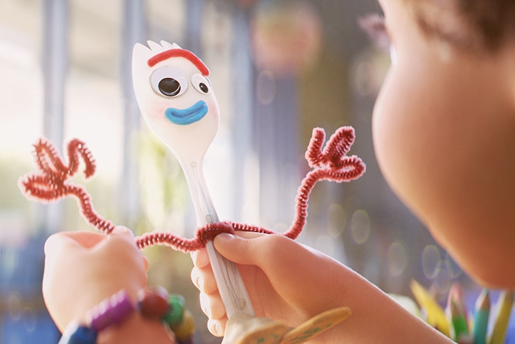 Colour close-up still looking over the shoulder of Bonnie holding toy Forky in her hands in 2019 animated film Toy Story 4.