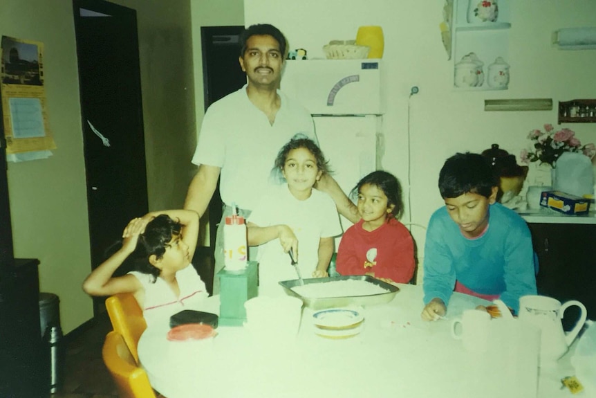Photograph of the Patel family in their kitchen in Albury, New South Wales, from 20 years ago.