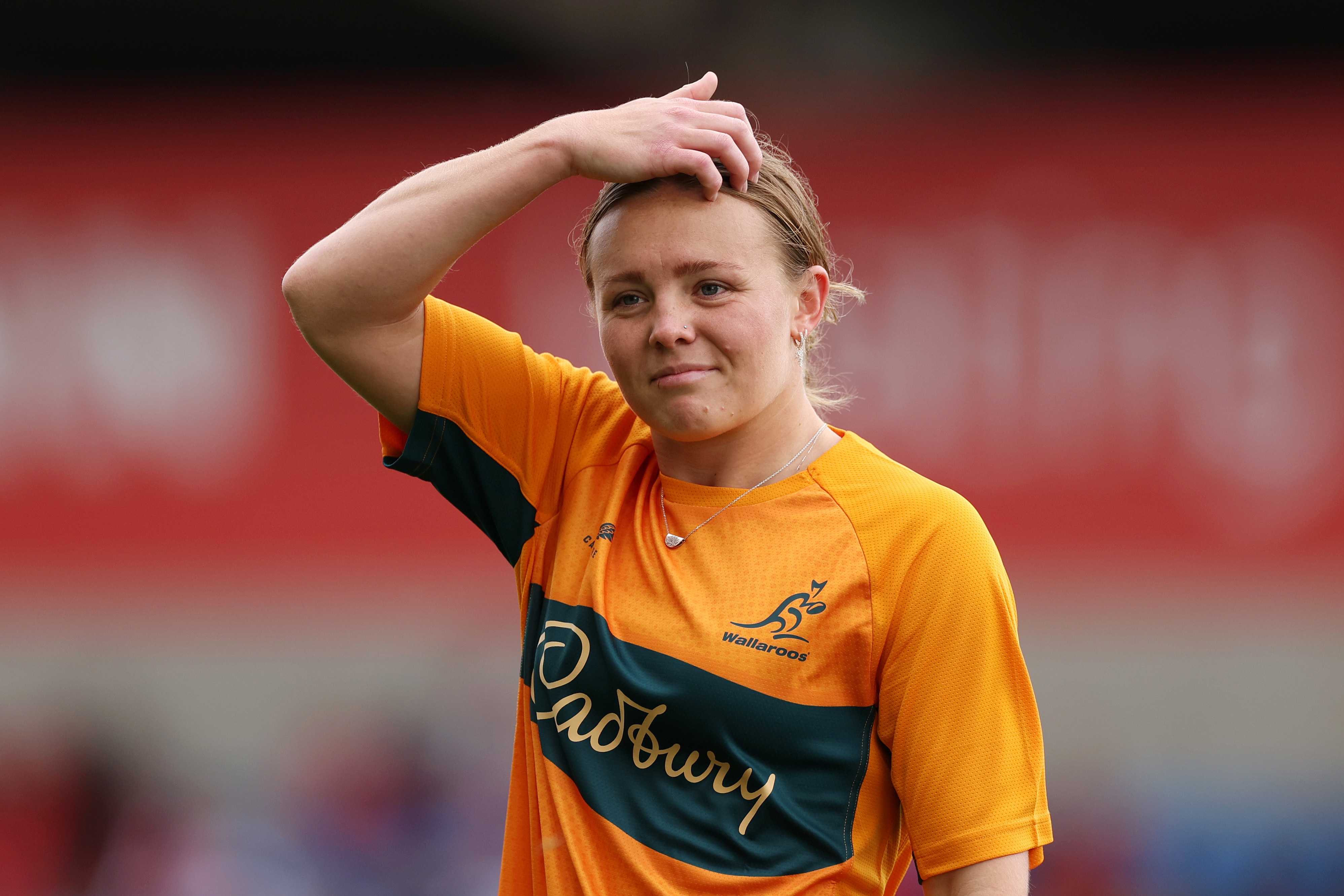 Piper Flynn warms up for the Wallaroos before a Test in 2026.