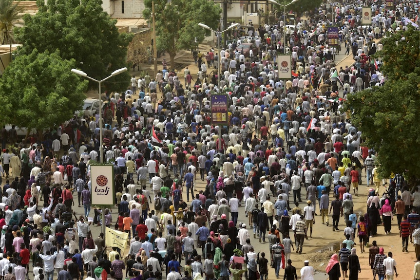 Sudanese protesters march in a demonstration against the country's ruling generals.